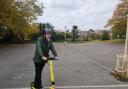Cllr Peter Partington trying out one of the e-scooters