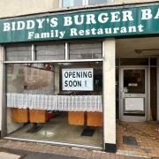 An 'Opening soon' sign has gone up at Biddy's Burger Bar in Taunton.